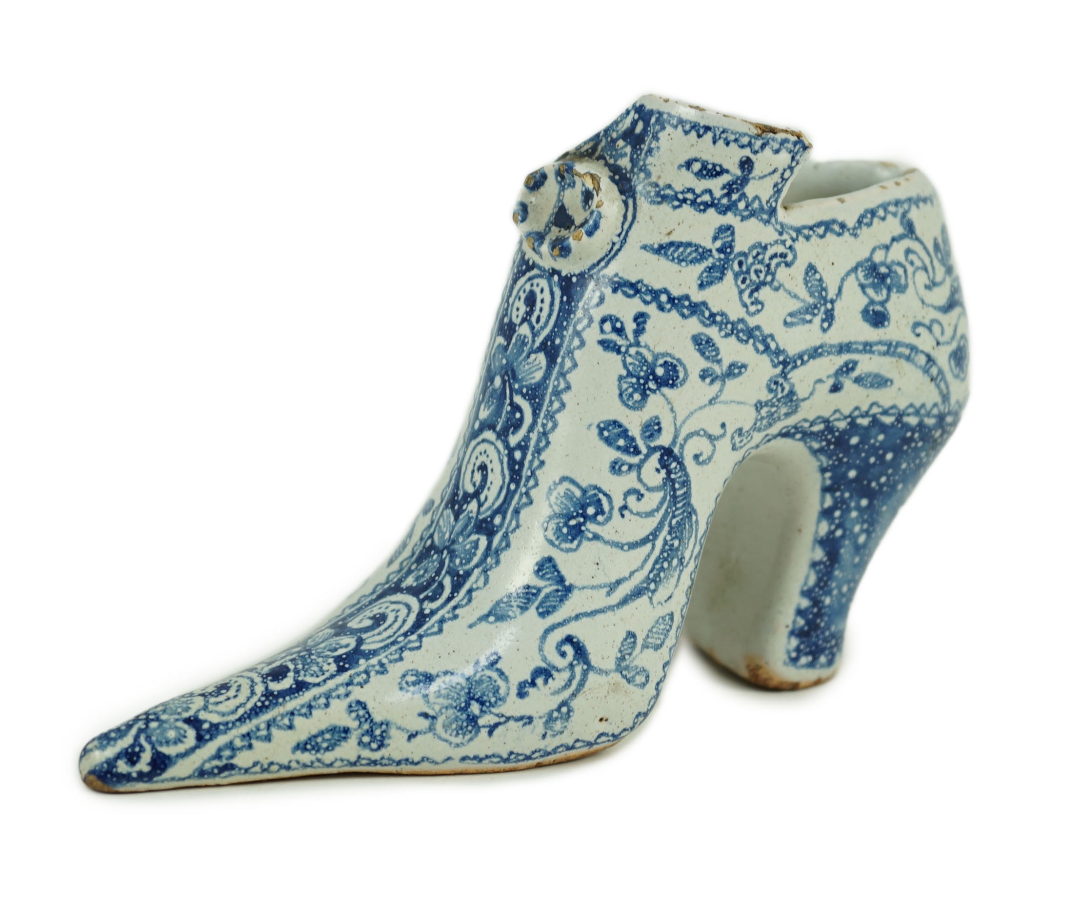 A documentary English delftware blue and white model of a shoe, dated 1732, 16cm long, damage